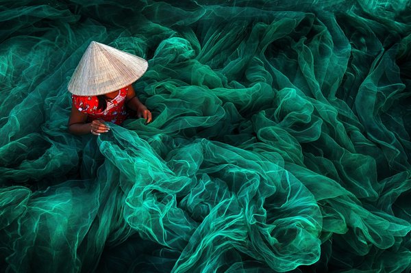 越南潘郎市（Phan Rang）的结网村妇